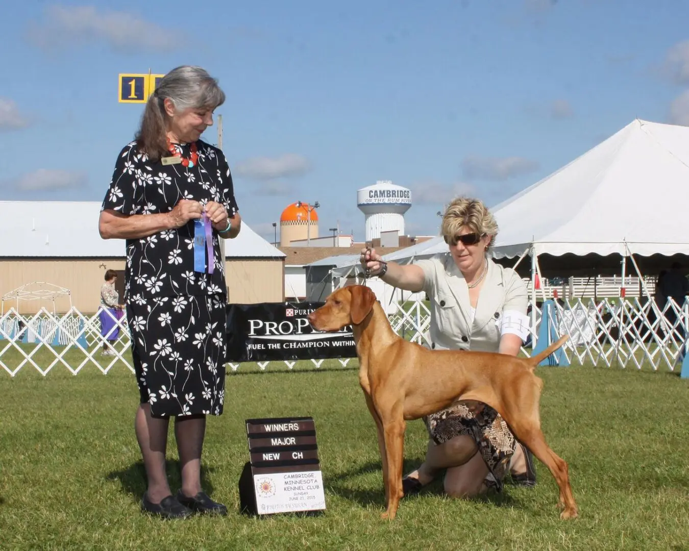 two women and a dog